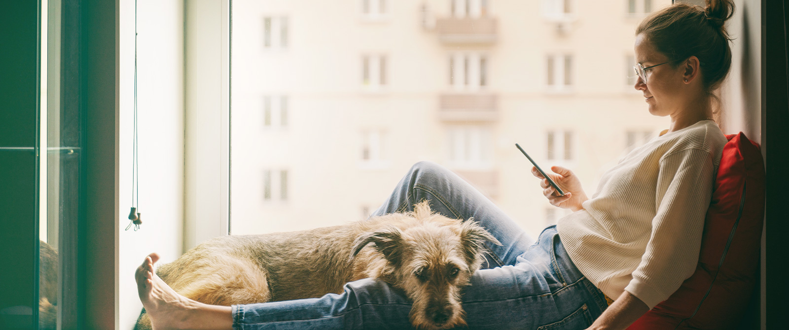 Woman relaxing with her dog